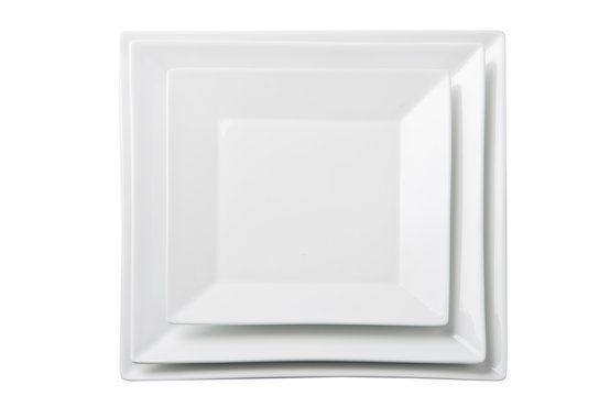 Three empty square white plates