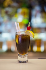 Cuba Libre cocktail on a bar