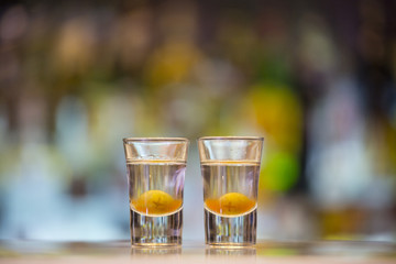 Pair of Hot Vodka shots on a bar