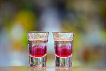 Pair of After Shock shots on a bar