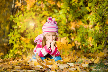 Autumn portrait of a little girl