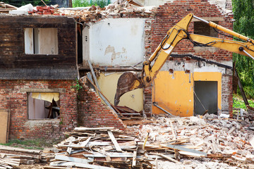 House demolition with excavator