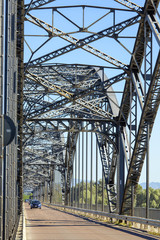 Iron bridge over the Po river color image