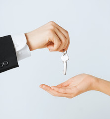 man and woman with house keys