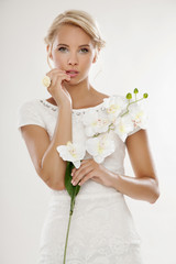 Young bride in white wedding dress happy smiling