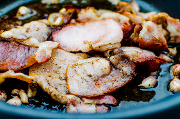Canadian bacons fried with garlic