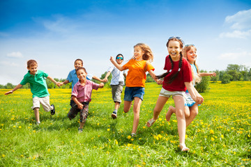 Group of happy running kids