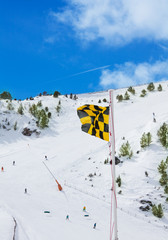 Avalanche medium risk warning flag
