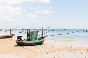 Fototapeta na wymiar Thai fishery boat on the beach