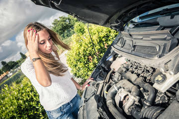 Young Woman with Damaged Car