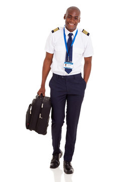 Young Airline Pilot Carrying Briefcase