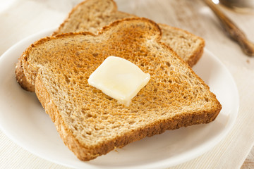 Fototapeta na wymiar Whole Wheat Buttered Toast