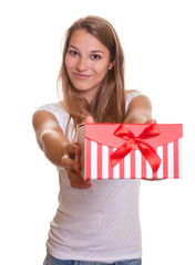 Smiling girl has a present for christmas