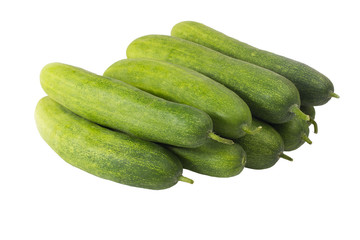 Fresh green cucumbers on white