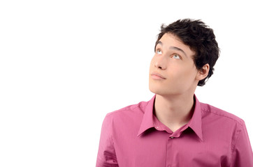 Portrait of a handsome business man looking up.Isolated.