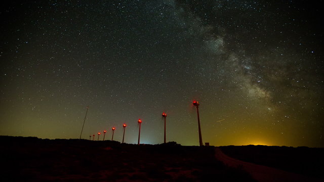 wind turbines generating clean power with milky way 4