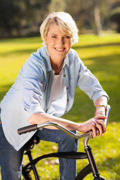 senior woman riding a bike