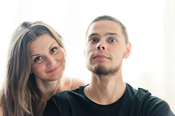 Attractive man and woman being playful