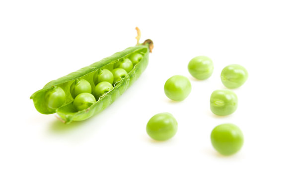  fresh green peas isolated on a white background