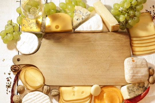 Various types of cheese with empty space background concept