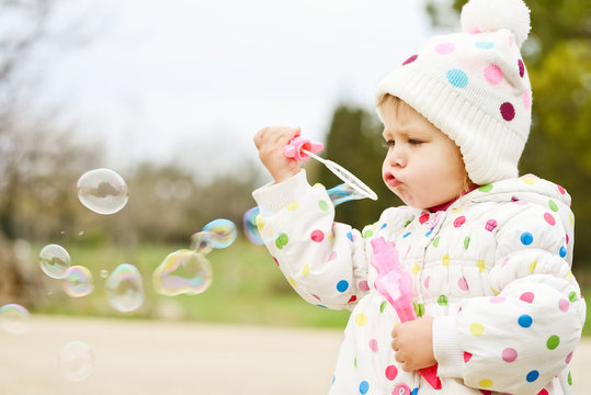 Cute Toddler With Soap Bubbles