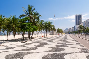 Fotobehang Copacabana, Rio de Janeiro, Brazilië Copacabana with palms and mosaic of sidewalk in Rio de Janeiro
