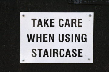 Warning sign take care when using this staircase