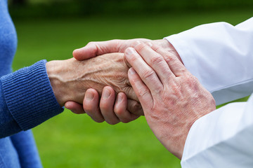 Doctor helping a woman
