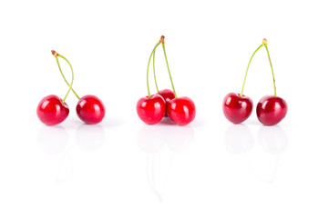 Obraz na płótnie Canvas Sweet red cherries isolated on white