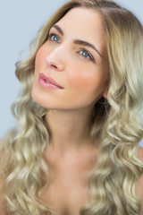 Naklejka premium Thoughtful gorgeous blond model posing
