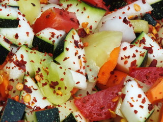 Chopped seasonal vegetables in a large pan