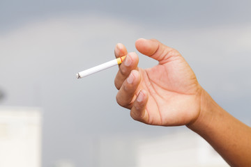 Cigarette in hand
