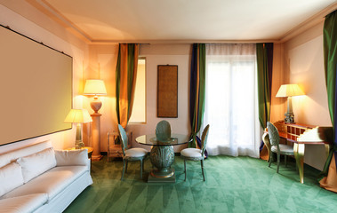 Interior luxury hotel, living room with white divan