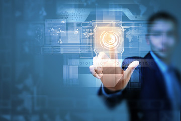 Businessman touching icon