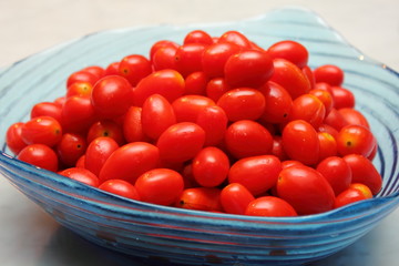 Cherry tomato in the glass bowl