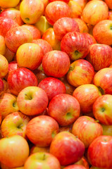 Lots of bright apples in supermarket