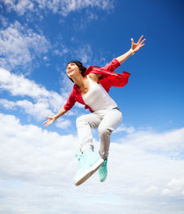 Obraz premium beautiful dancing girl jumping