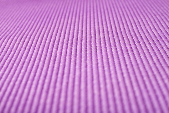 Close Up Shot Of A Purple Yoga Mat