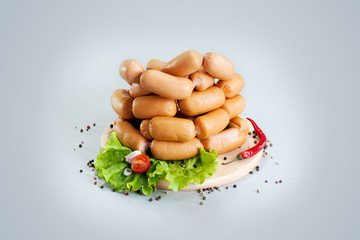 A composition of different sorts of sausages and meat