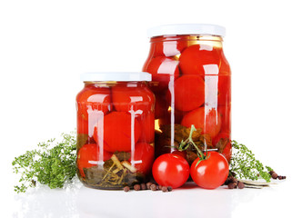 Tasty canned and fresh tomatoes, isolated on white