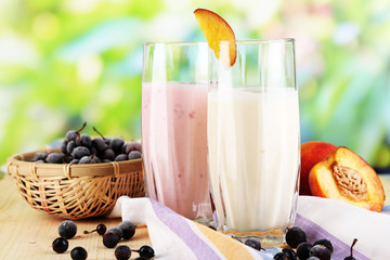 Delicious milk shakes with blackberry and peach