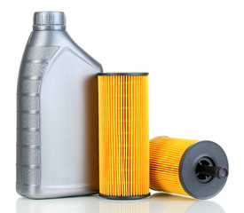 Car oil filters and motor oil can isolated on white