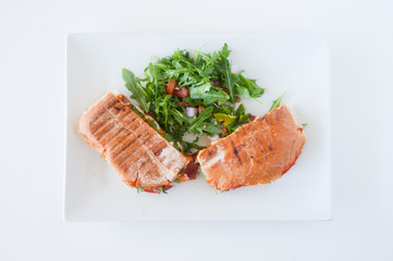 italian ciabatta panini sandwich with chicken and tomato