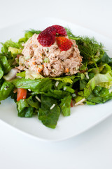 fresh chopped tuna salad topped with strawberries