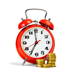 Alarm clock and yellow coins
