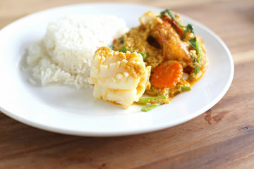 Squid with curry powder on rice