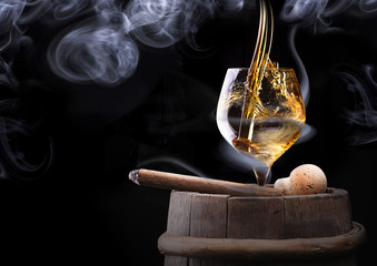 Cognac glass shrouded in a smoke