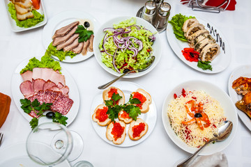 the food in the restaurant on a white tablecloth