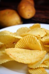 Potato chips and fresh potato