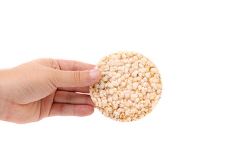 Hand holds rice cake
